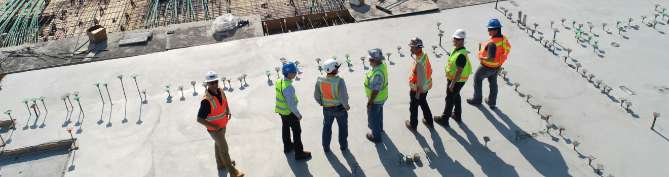 Construction professionals working on a building site in Australia